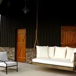 Sedia a dondolo di legno